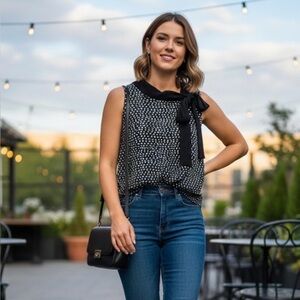 Deletta Black and White Sleeveless Blouse with Bow